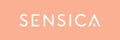 White 'SENSICA' logo on a peach background